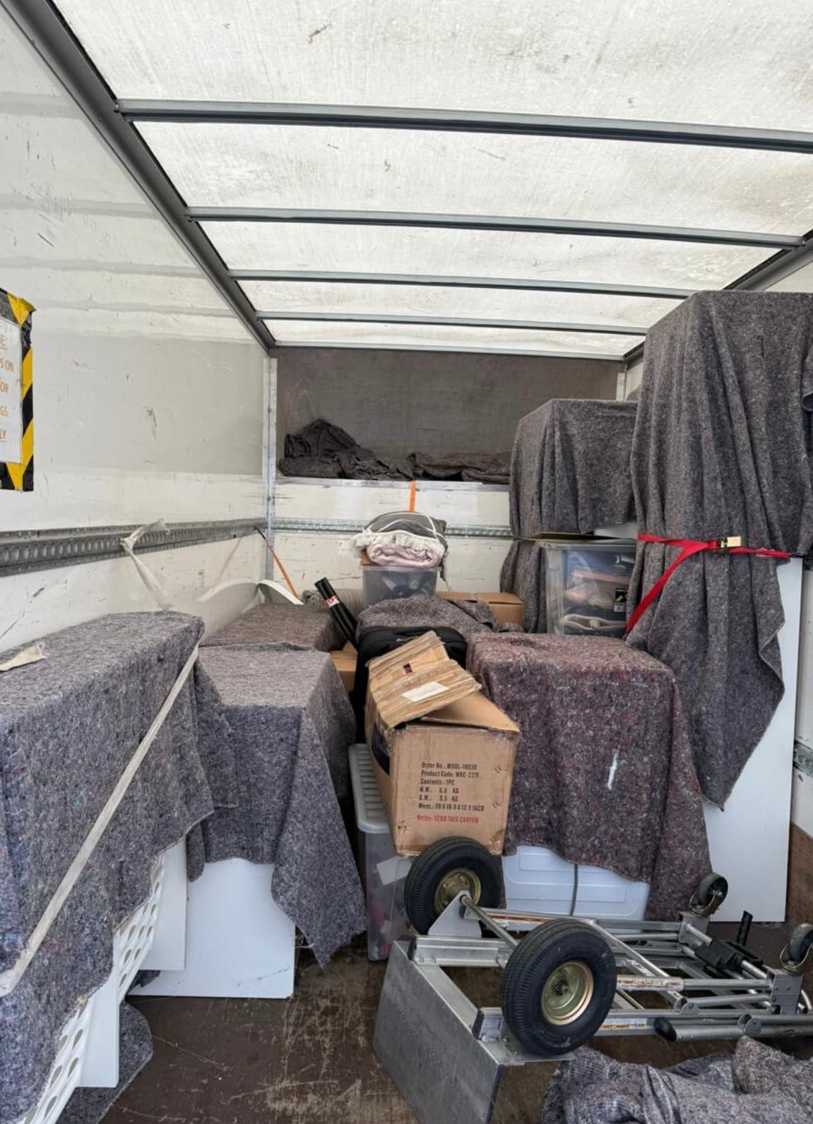 Inside the van — items carefully covered with protective blankets