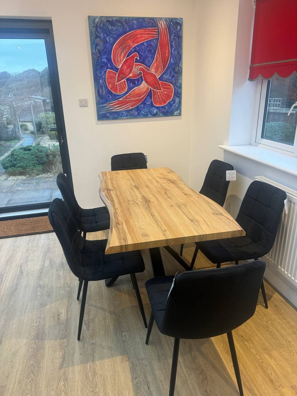 Professional flooring installation with furniture